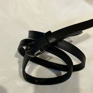 EUC slender black leather belt with stamped stars edge